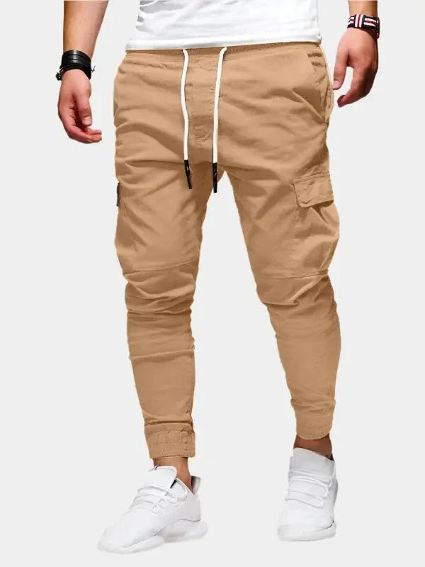 https://cdn.shopify.com/s/files/1/0713/1050/8289/files/casual-jogger-trousers-cross-crown-175442.webp?v=1754020900