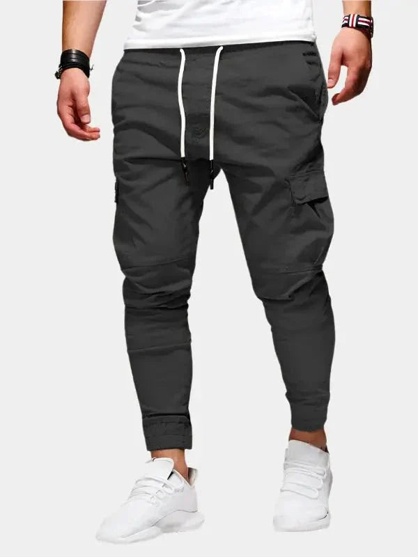 https://cdn.shopify.com/s/files/1/0713/1050/8289/files/casual-jogger-trousers-cross-crown-239118.webp?v=1748047814