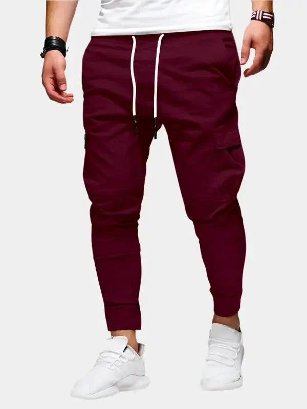 https://cdn.shopify.com/s/files/1/0713/1050/8289/files/casual-jogger-trousers-cross-crown-272488.webp?v=1748047814