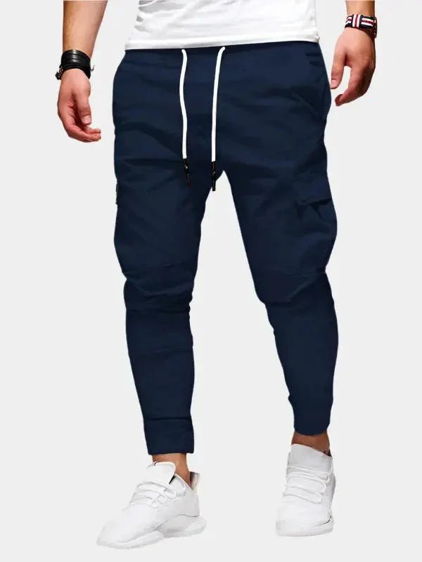 https://cdn.shopify.com/s/files/1/0713/1050/8289/files/casual-jogger-trousers-cross-crown-362643.webp?v=1748047815