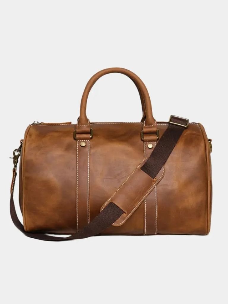 https://cdn.shopify.com/s/files/1/0713/1050/8289/files/rome-duffle-bag-cross-crown-509504.jpg?v=1749073040
